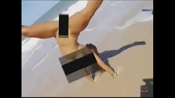 Gatas na praia nudismo